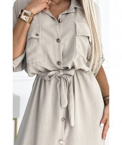 Beżowa sukienka typu Szmizjerka midi ze złotymi guzikami i wiązaniem