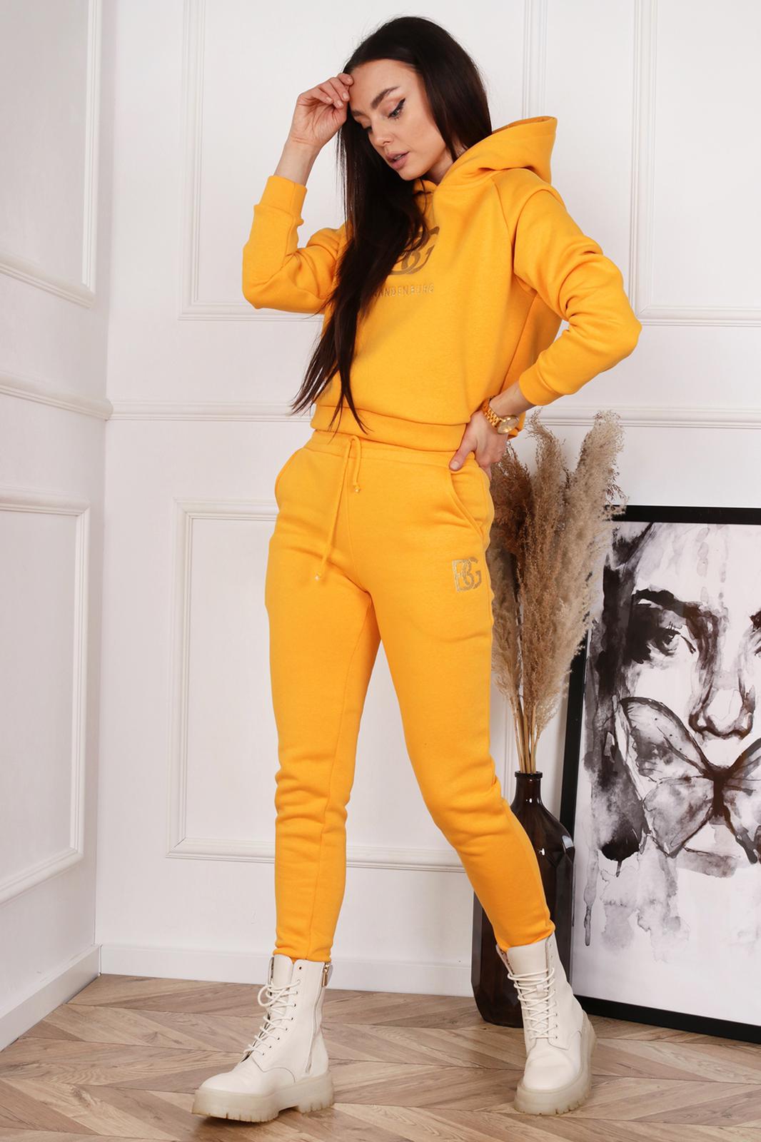 pomarańczowy dres damski